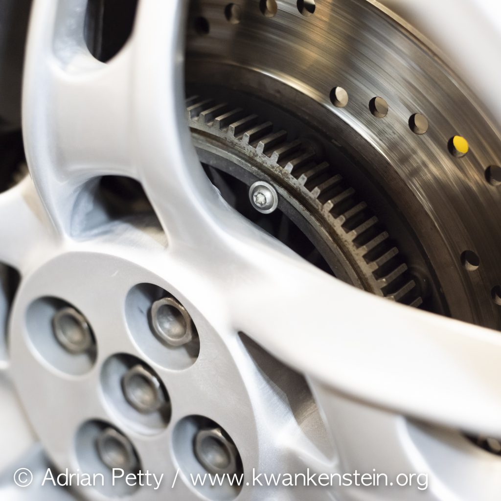 When fitting a wider 5.5" BMW K1200RS rear wheel to a BMW K1100RS the retaining bolts for the ABS sensor ring need to be exchanged to allow for clearance.