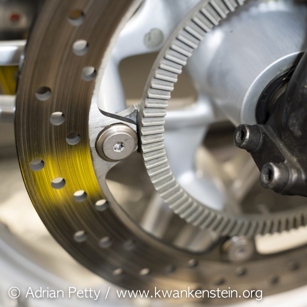 View of a BMW K1100RS fitted with a BMW K1200RS front wheel. The brake disk retaining bolts need to be exchanged to allow clearance for the fork legs. Use genuine BMW parts.